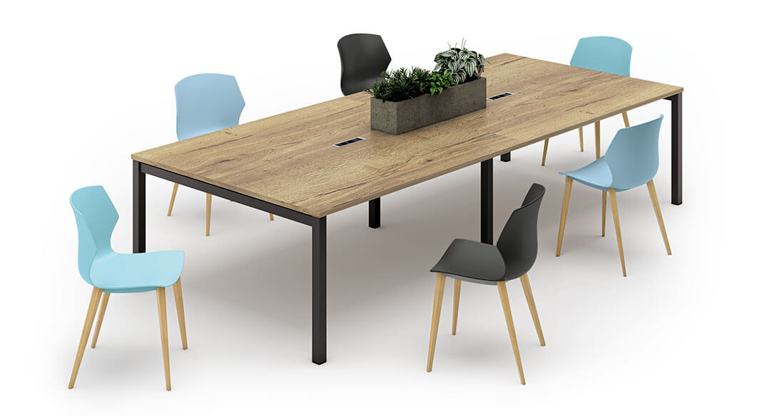 photo de la grande table de réunion Cowork' avec bac de plantes